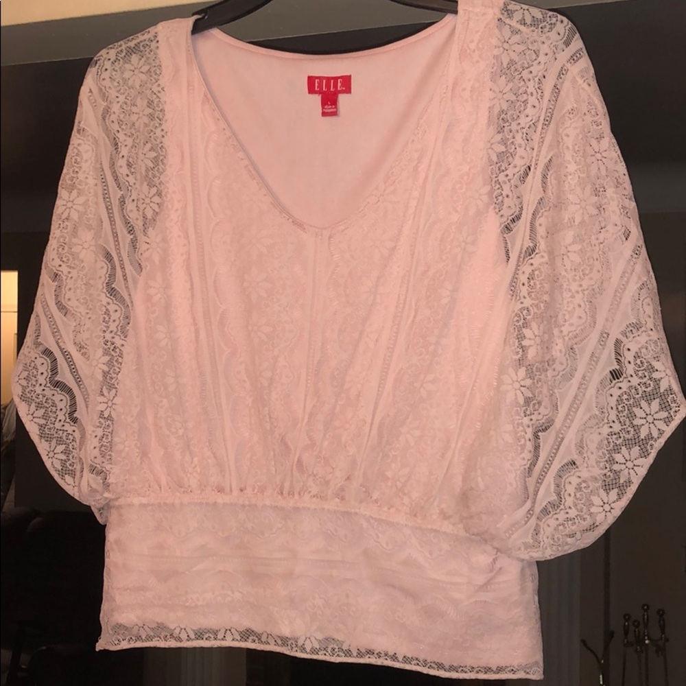 Soft Pink lace with tank underneath.